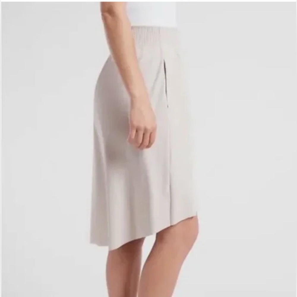 ATHLETA Cosmic Skirt Size L Hi Low Hem Elastic Waist Stretch Zip Pockets Neutral